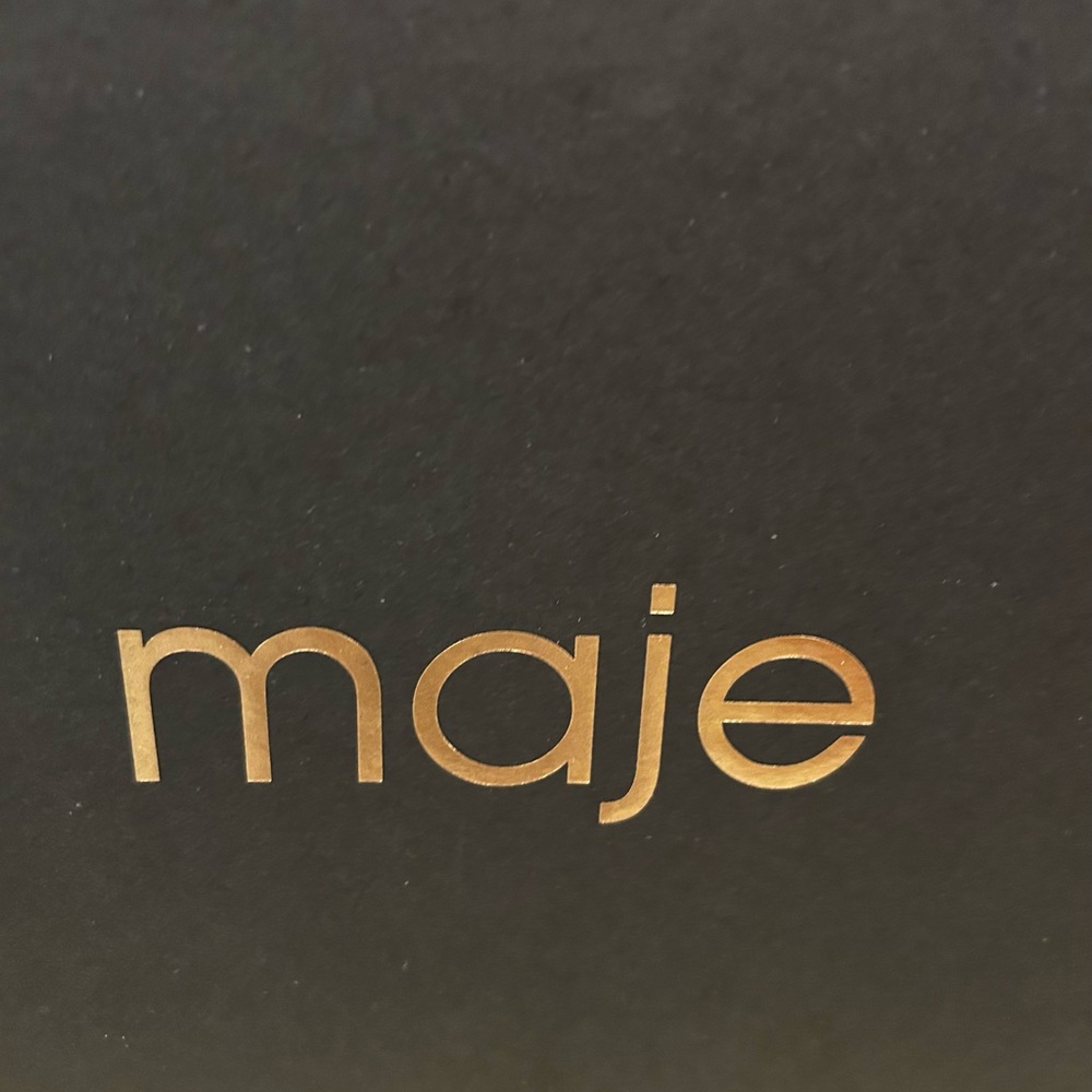 Maje Black and Gold Logo